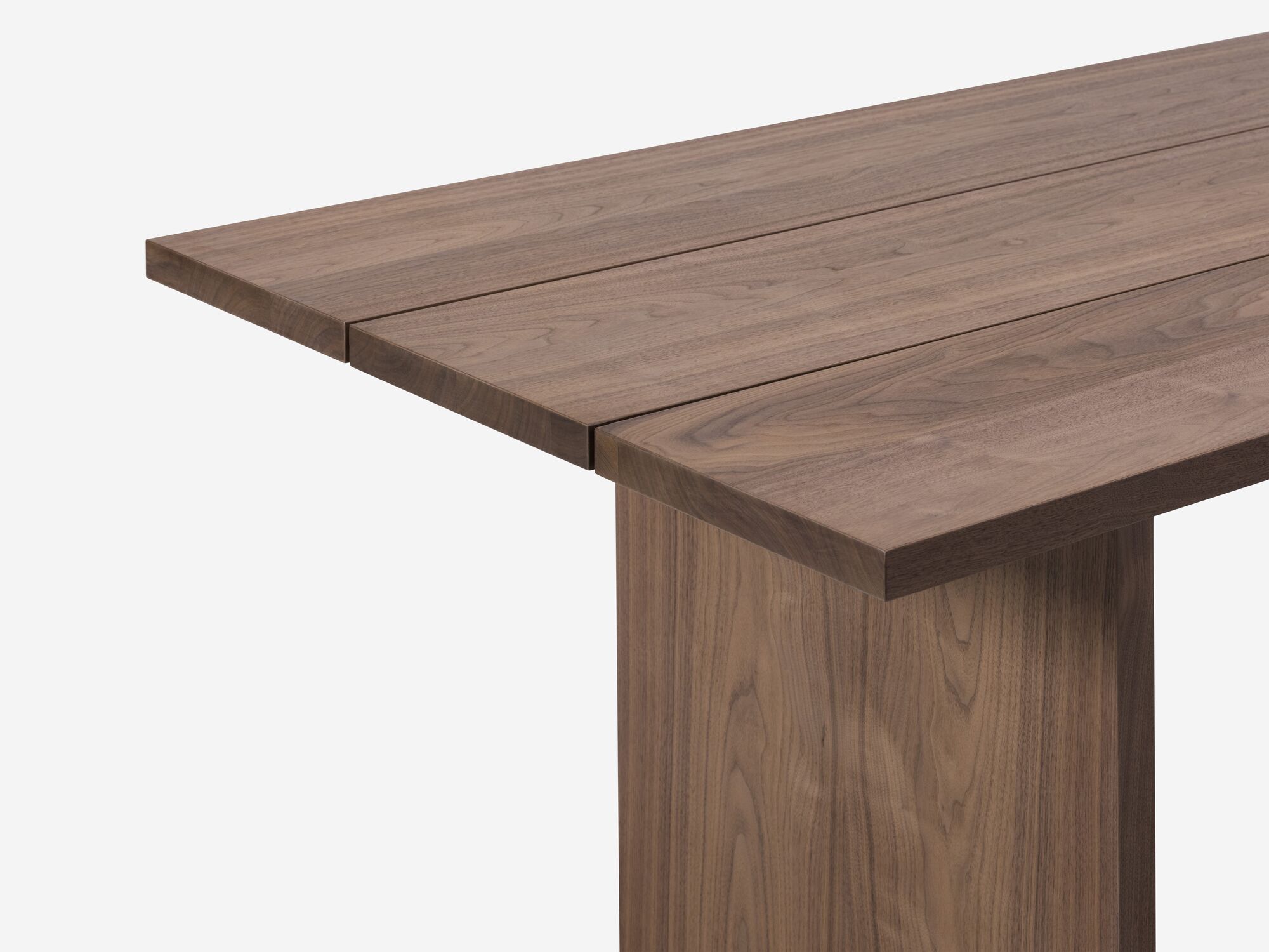 Walnut dining table with two legs detail view